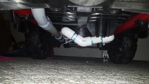 2007 Subaru Impreza - Custom PVC pipe modification visible on the undercarriage of an ATV.