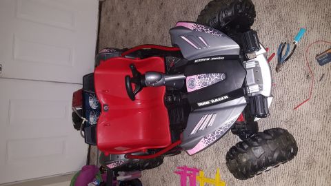 2007 Subaru Impreza - Toy dune buggy with "DUNE RACER" text on its body, sitting on carpet.