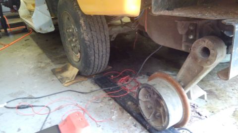 1996 Ford Bronco - Had to do some electrical work above the Hy rail wheels. So I had to quickly set up some "rails" for the truck to sit on so I don…