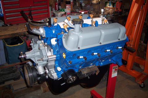 1995 Ford Bronco - Ford V8 engine on an engine stand, likely undergoing rebuild or restoration.