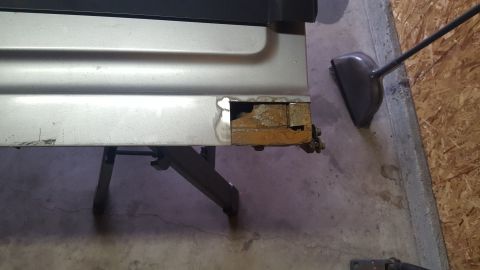 1995 Ford Bronco - More metal cut out, and more surface rust behind.
