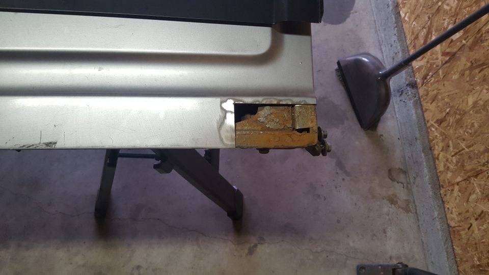 More metal cut out, and more surface rust behind.