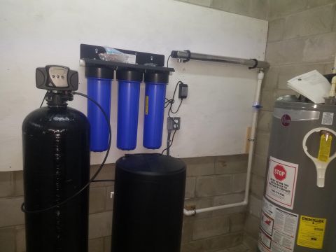 1994 Ford Bronco - Photograph of household water treatment equipment, not a technical document.