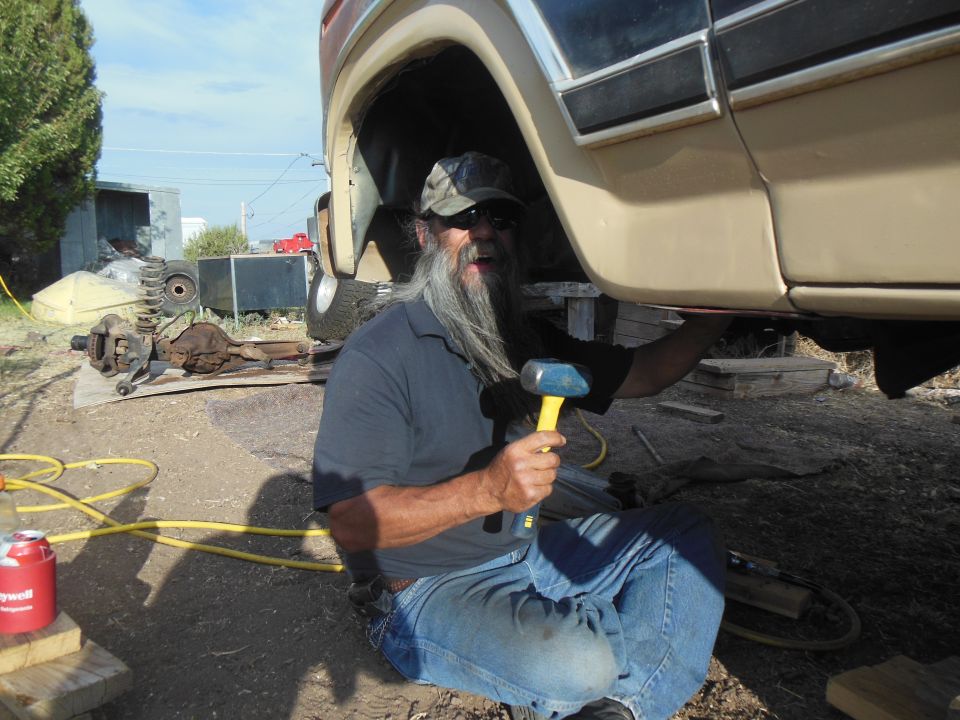 my dad helping bang on some rivets!