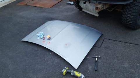 1995 Ford Bronco - Not much to do here, but of course hail had to hit the ridge in the center of the hood, making repair a little more difficult.