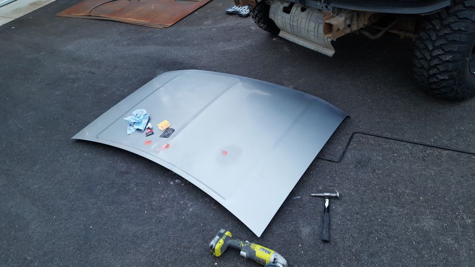 Not much to do here, but of course hail had to hit the ridge in the center of the hood, making repair a little more difficult.