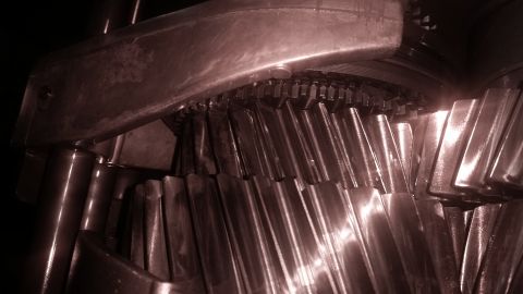 1985 Ford Bronco - Close-up view of helical gears within a transmission or transfer case. The metallic gears are arranged in rows with visible teeth and are i…