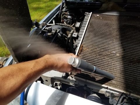 2004 Ford Crown Victoria - This Sunex pneumatic vacuum works great outdoors without the bag.