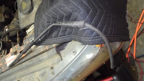 1996 Ford Bronco - An vacuum hose repair from the railroad's "auto mechanic" piece of fuel line slid over the leaky vacuum line then black rtved in…
