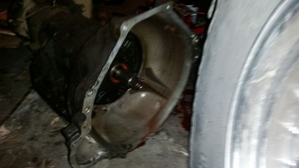 Transmission bell housing with torque converter visible inside