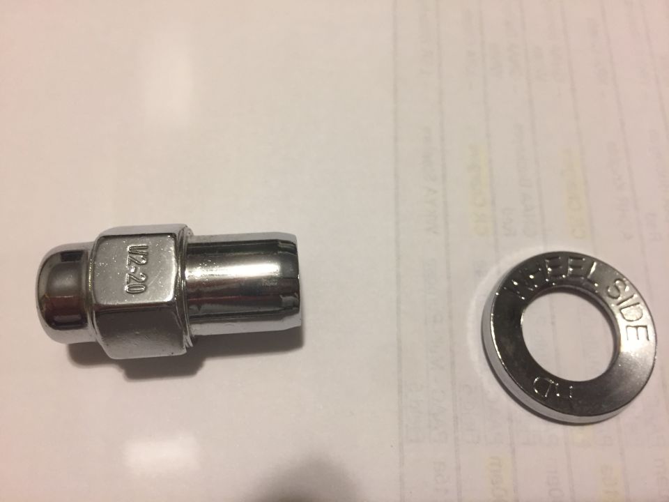 Lug nut marked U2-20 and a washer marked WHEEL SIDE