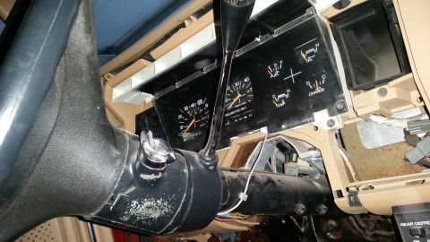 1985 Ford Bronco - Interior view of a 1985 Ford Bronco, showing the dashboard, gauges, and steering column.