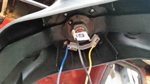 1985 Ford Bronco - This photo shows the wiring for a vehicle's headlight assembly.
