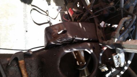 1985 Ford Bronco - Close-up view of an engine mount within an engine bay, with a Supermotors.net watermark in the lower right corner.