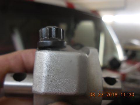 1979 Ford Bronco - # 2 intake adjuster jammed to the end of travel threads stripped.