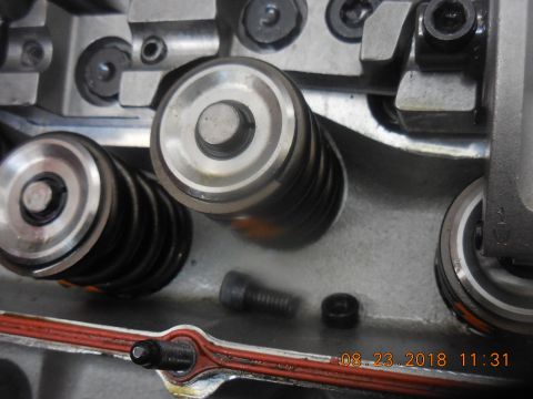 1979 Ford Bronco - lash cap and top of bolt found near intake spring