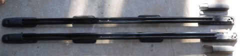 1992 Ford Bronco - Went ahead and mounted the 4 feet per rail, reusing one of the clip holes to adjust the spacing for the original middle foot. I used an end…