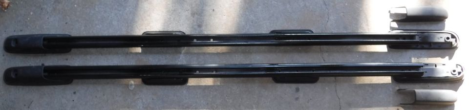 Went ahead and mounted the 4 feet per rail, reusing one of the clip holes to adjust the spacing for the original middle foot.  I used an end mill to recess the new clip holes like the stock ones.