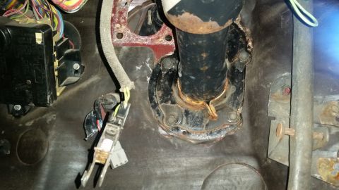 1985 Ford Bronco - This photo shows the steering column assembly and associated wiring within a vehicle's cabin.