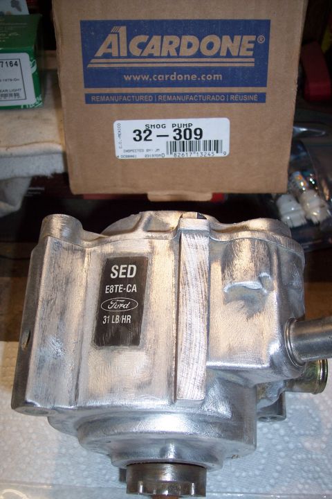 1995 Ford Bronco - A remanufactured Ford power steering pump is shown next to its box from Alcardone.