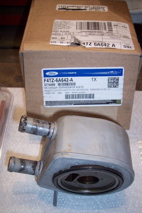 1995 Ford Bronco - Ford F4TZ-6A642-A oil cooler part in its original packaging.