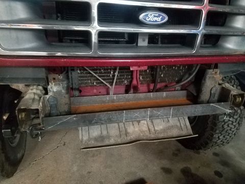 1995 Ford Bronco - Custom bumper fabrication on a 1995 Ford Bronco, showing the front grille and radiator area.