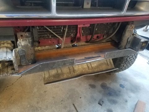 1995 Ford Bronco - Custom metalwork is being done on the front bumper of a vehicle.