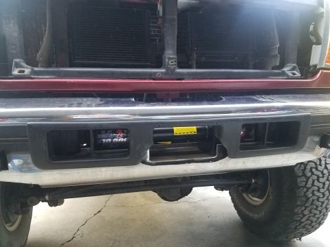 1995 Ford Bronco - Winch installation complete on the front bumper of a 1995 Ford Bronco.
