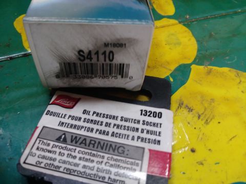 1996 Ford Bronco - This image shows an oil pressure switch socket part, labeled S4110 and 13200, with a warning about California Proposition 65.
