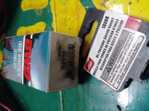 1996 Ford Bronco - Packaging for BWD engine management technology and a Lisle oil pressure switch socket are shown.