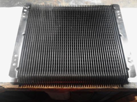 1995 Ford Bronco - Radiator core shown from the front, with visible mounting holes on the sides.
