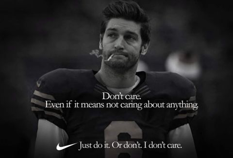 1996 Ford Bronco - A black and white photo shows a football player wearing a jersey with the number 6 on it, smoking a cigarette. Text overlays the image with…