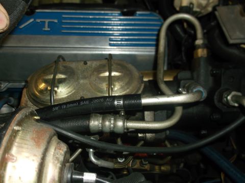 1979 Ford Ranchero - Close-up view of the brake master cylinder and associated brake lines in an engine bay. Text on one of the brake lines reads "3/8" (9.5mm)…