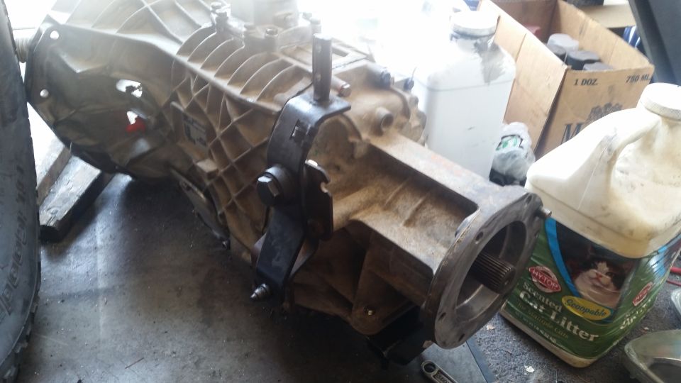 Heavy-duty transmission assembly in a workshop.