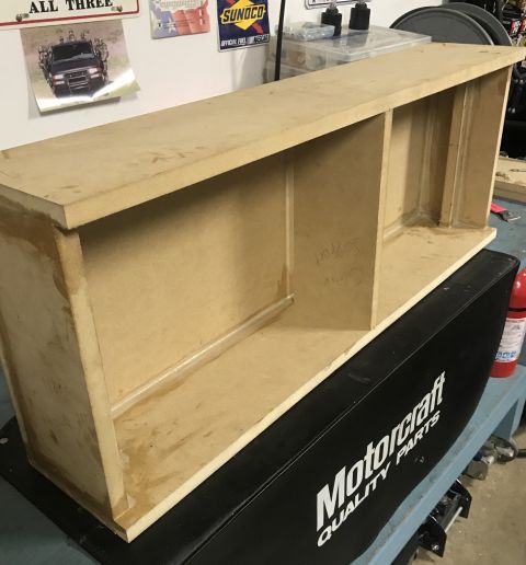 1995 Ford Bronco - A custom wooden enclosure sits atop a black stand displaying "Motorcraft QUALITY PARTS" branding.