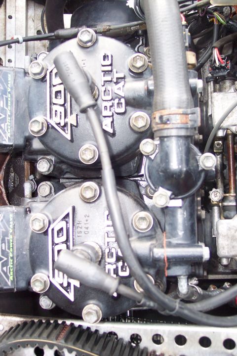2004 Arctic Cat King Cat 900 - Twin Arctic Cat engine cylinders are visible, with "900" marking the engine size.