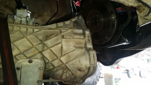 1985 Ford Bronco - Transmission and flywheel assembly shown from underneath, possibly part of a ZF swap.