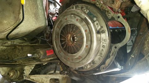 1985 Ford Bronco - Clutch and flywheel assembly detail, likely during a transmission swap or repair.