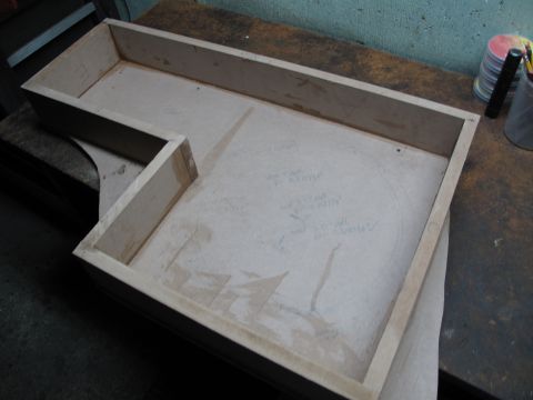 1994 Ford Bronco - A custom-built subwoofer box is shown, with pencil markings on its surface.