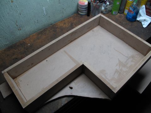 1994 Ford Bronco - Custom subwoofer box construction in progress, made from particle board.