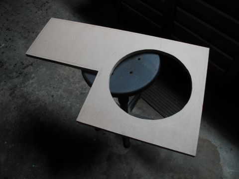 1994 Ford Bronco - A custom-cut MDF panel with a large circular opening, ready for speaker installation.