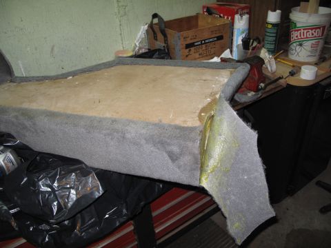 1994 Ford Bronco - This carpeted automotive part shows signs of construction and is not a complete vehicle.