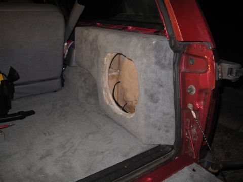 1994 Ford Bronco - Custom subwoofer box installation in the rear cargo area of a 1994 Ford Bronco.