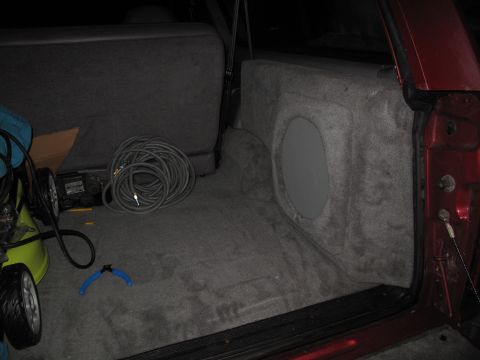 1994 Ford Bronco - Custom subwoofer box installed in the cargo area of a 1994 Ford Bronco.