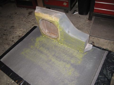 1994 Ford Bronco - A custom-built subwoofer enclosure, possibly for a vehicle, is shown covered in yellow dust.