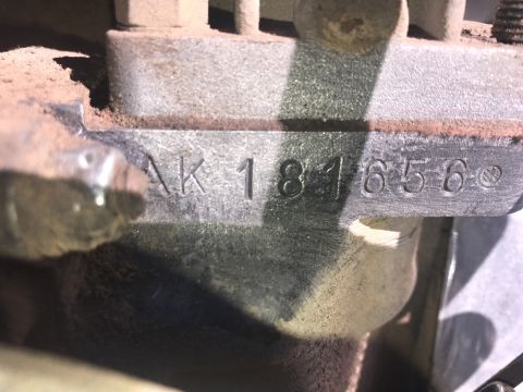 1970 Volkswagen Beetle - Close-up of a stamped metal part with identification numbers.