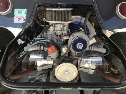 1970 Volkswagen Beetle - Modified Volkswagen engine bay a turbocharger and custom exhaust components.