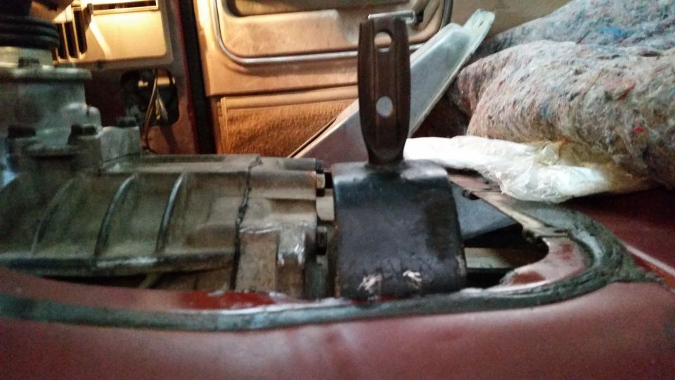 Transfer case and shift lever inside a vehicle.