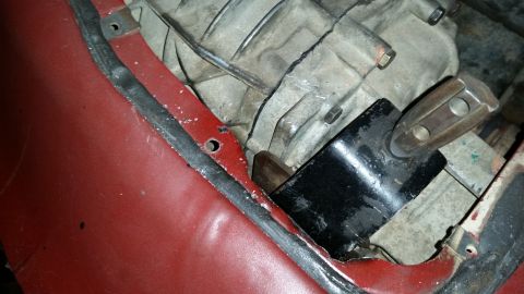 1985 Ford Bronco - Transmission and mounting bracket detail, likely part of a vehicle's drivetrain system.
