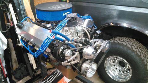 1978 Ford Bronco - Custom V8 engine assembly with polished aluminum components and blue ignition wires.
